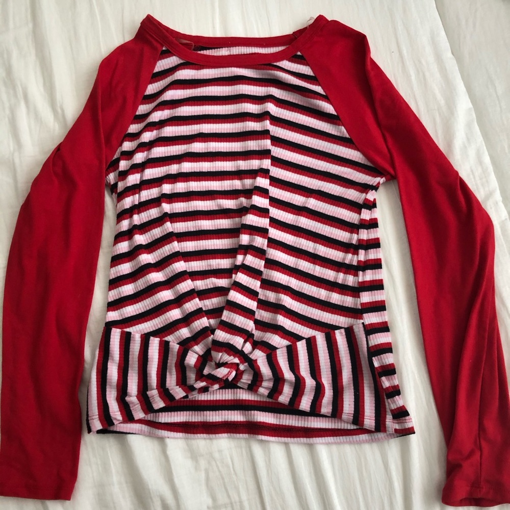 Red sleeved striped shirt.